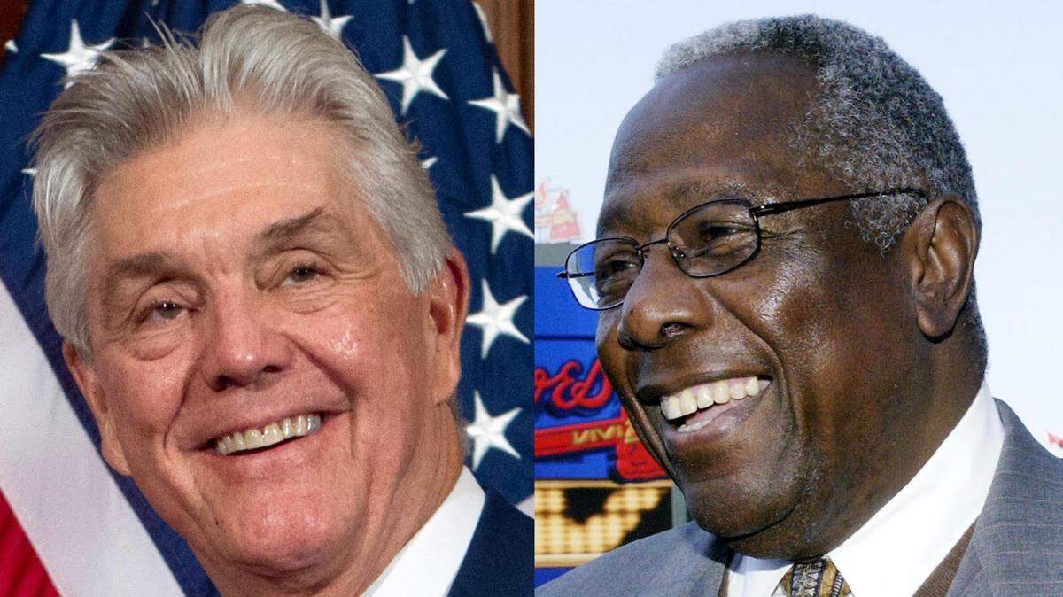United States congressman Roger Williams of Texas (left) fondly recalls his time as a teammate with Hank Aaron. Aaron died on Friday at the age of 86.