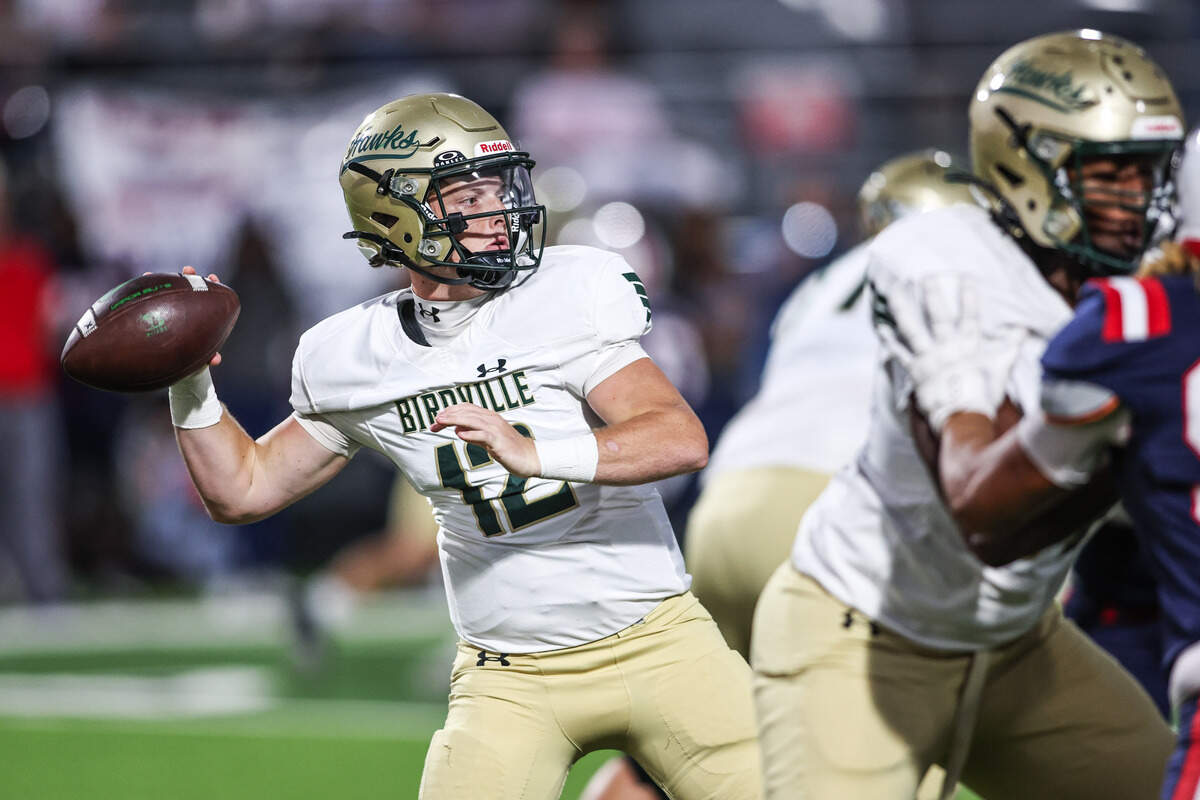 Birdville quarterback Zach Wells throws the ball in the Friday, Sept. 26, game at Birdville ISD FineArts/Athletics Complex.