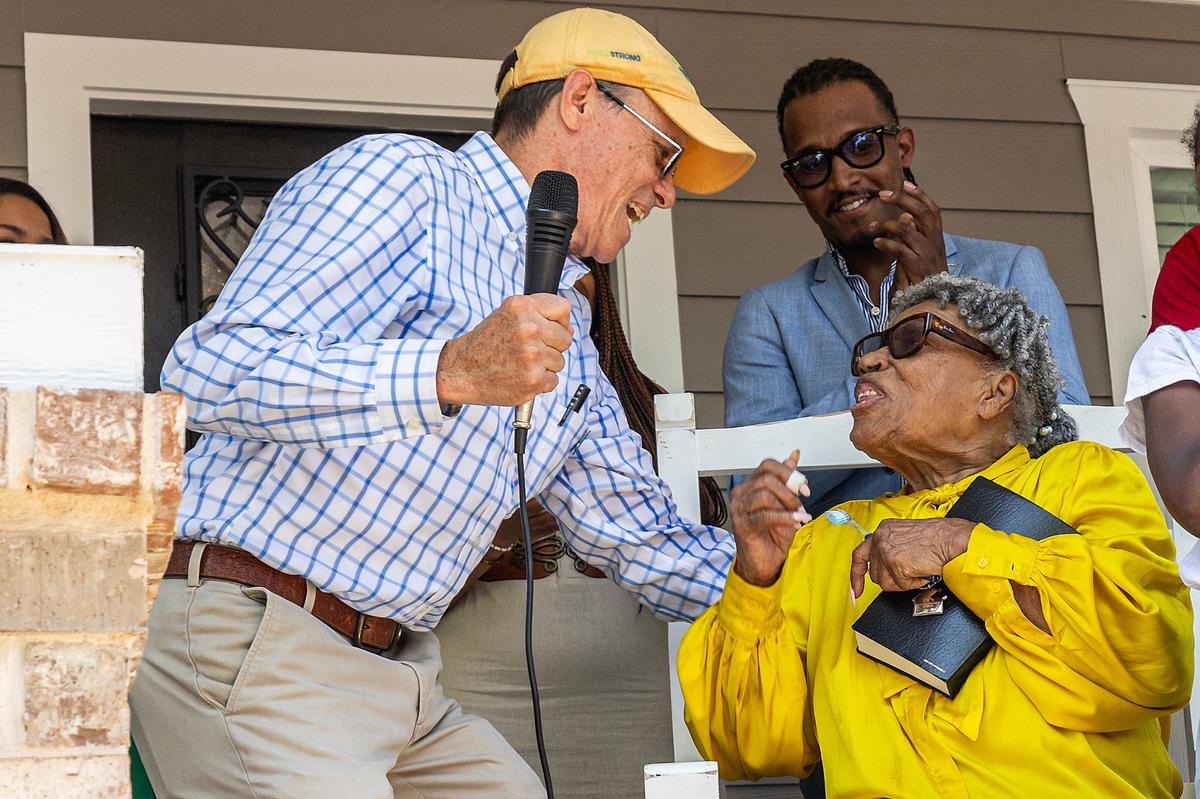 Gage Yager, the CEO of Trinity Habitat For Humanity, embraces Opal Lee during a celebration to commemorate Lee’s new house at Historic Southside in Fort Worth on Friday.