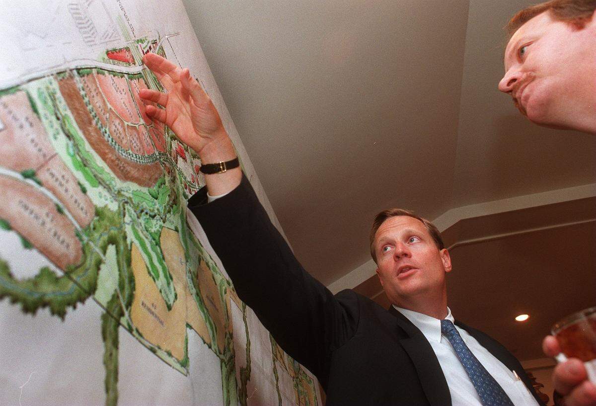Aug. 20, 1997: Ross Perot Jr. shows Roanoke Mayor Toby Alsip different parts of his conceptual master plan for Circle T Ranch, which includes upscale retail, commercial and residential development encompassing more than 2,400 acres, three 18-hole golf courses, corporate campuses, and other retail and office developments.