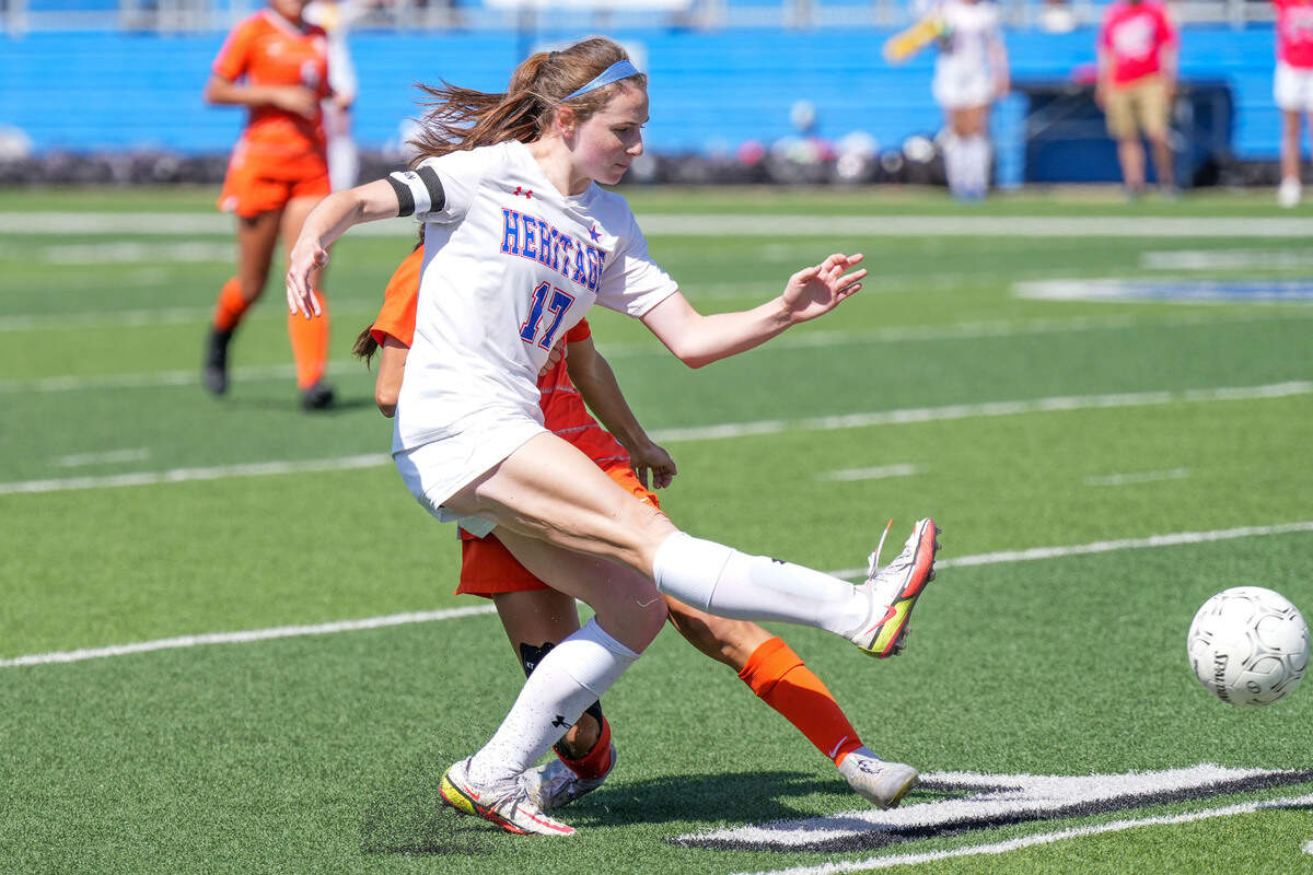 Midlothian Heritage forward Kerry Scott kicks a ball against Celina in the 4A title game (Ken Murphy/MaxPreps)