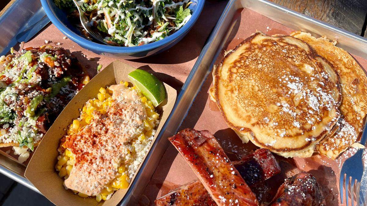 Brunch at Del Toro BBQ: Pancakes with honey-glazed ribs, elote, a brisket chalupa and cornbread with chili and cole slaw.