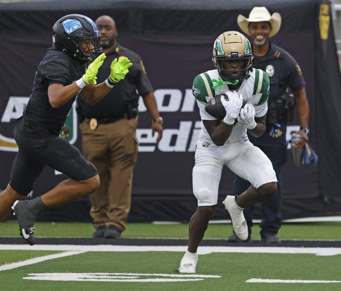 DeSoto wide receiver Antron Edmundson (9) hauls in a pass for the first offensive play of the first half of a UIL football game between DeSoto and North Crowley at Crowley ISD Multi-Purpose Stadium in Fort Worth, Texas, Friday, Sept. 05, 2025.