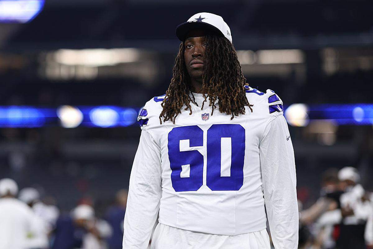 Cowboys offensive tackle Tyler Guyton walks off the field after a preseason game against the Atlanta Falcons on Aug. 22, 2025, at AT&T Stadium in Arlington.