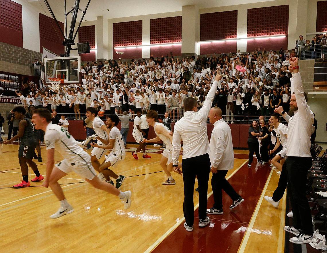 Hawks rush the court after winning the UIL 5A state semifinal playoff basketball playoff game at Lewisville High School in Lewisville Texas, Tuesday, Mar. 04, 2025.
