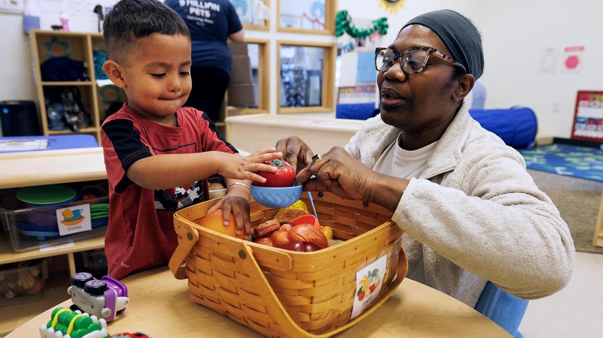 Teacher Carolyn Galloway plays with Eric, 2, at the Center for Transforming Lives Arlington Child Development Center on Friday, March 28. The facility has a partnership with UTA which allows full-time students to apply for a child care tuition scholarship offered through the university. This semester 18 students received the scholarship.