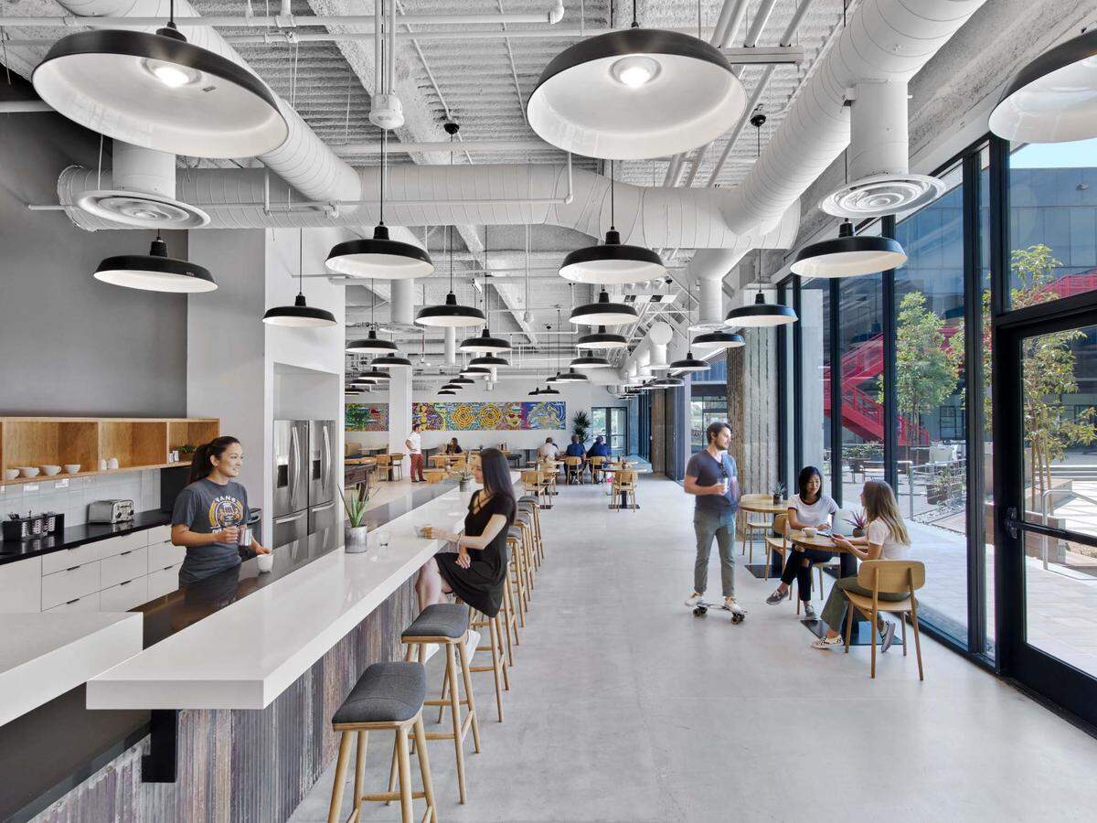 Employees gather at a coffee bar in Vans' headquarters in southern California.