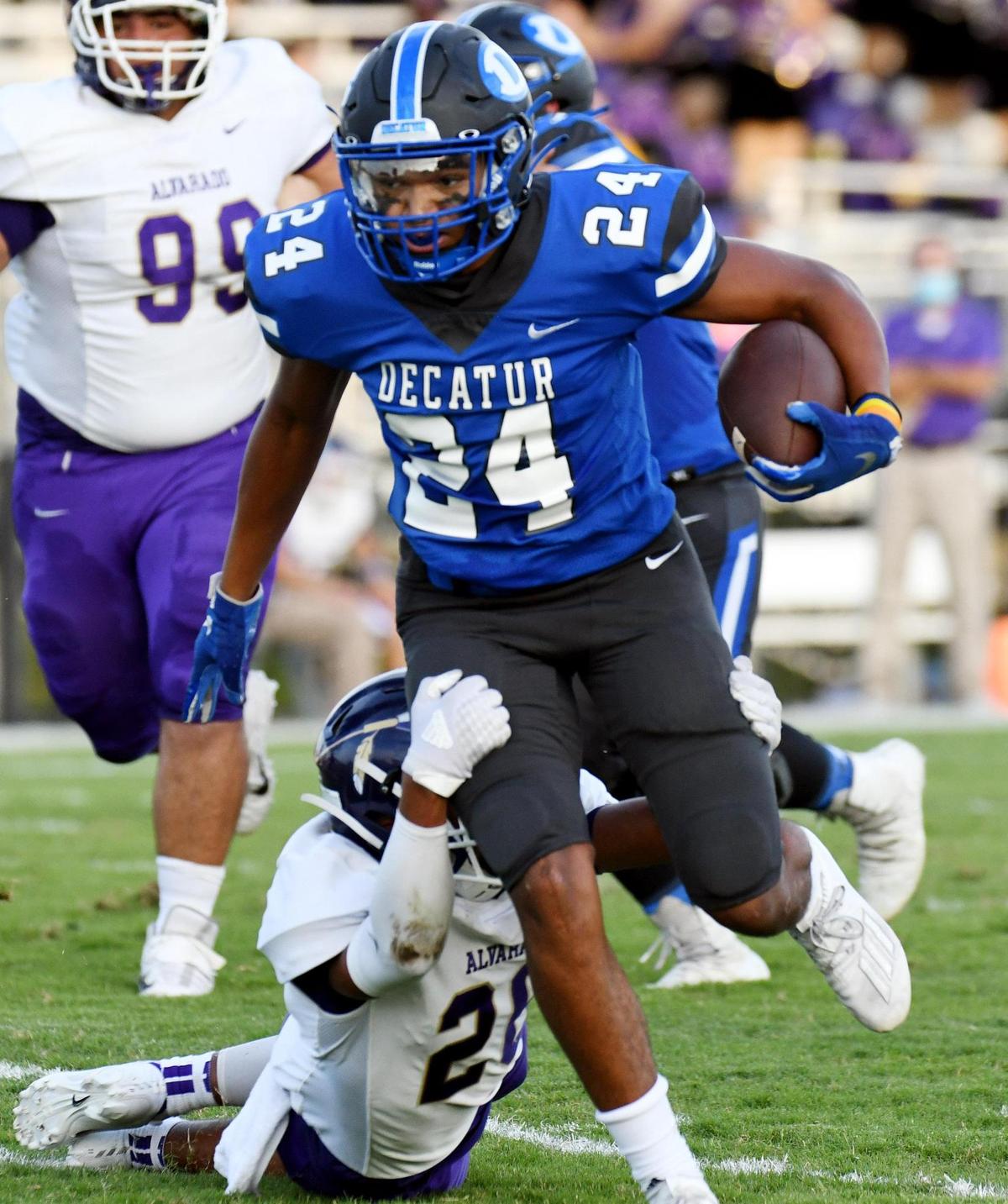 Decatur’s Kamerin Ferguson, right breaks away from Alvarado’s Kaden Ford for a 39 yard touchdown run to take a 12-0 lead in the first quarter of Friday’s September 4, 2020 Football game in Decatur, Texas. Decatur lead at the half 19-0. Special/Bob Haynes