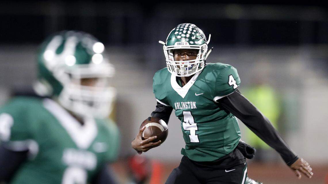 Arlington quarterback Jahari Rogers (4) takes off on a quarterback keeper during the first half of a high school football game at Maverick Stadium in Arlington, Texas, Thursday,  Nov. 08, 2018. Lamar led 10-7 at the half. (Special to the Star-Telegram Bob Booth)

