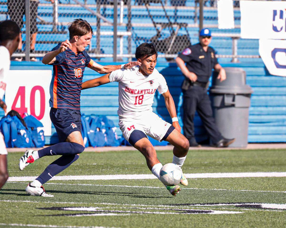 DUncanville’s Anthony Bernal attacks the Seven Lakes defense in a Class 6A state semifinal game at Birkelbach Field in Georgetown, Texas on April 12, 2024.