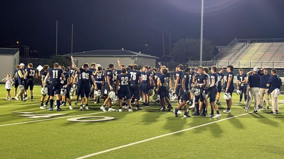 Keller football players celebrate after a win against Arlington Bowie at Keller ISD Stadium in Keller, Texas on Thursday, Sept. 5, 2024.