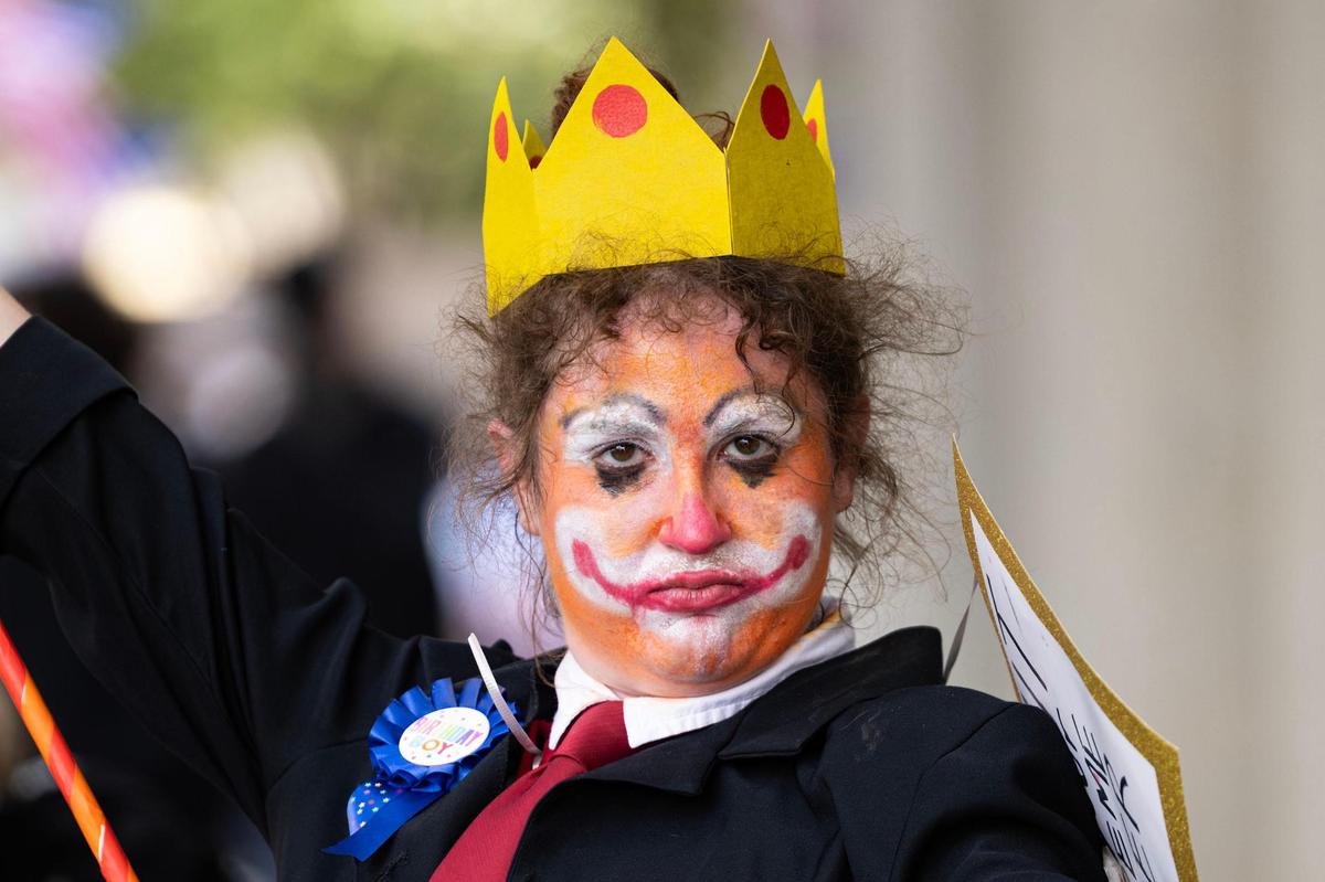 Community members rally during the “No Kings Day” protest in downtown Fort Worth on June 14, 2025.