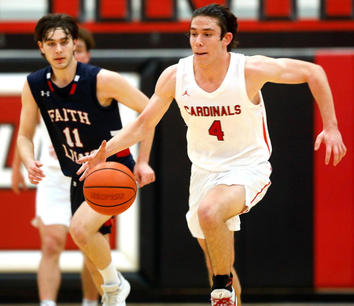Fort Worth Christian’s Nate Bledsoe (4) breaks away from Grapevine Faith’s Ryan Blevins (11) during the TAPPS 5A State Semifinal basketball game at Colleyville Heritage High School in Colleyville, Texas, Tuesday, March 09, 2021. Fort Worth Christian defeated Grapevine Faith 72-65. (Special to the Star-Telegram Bob Booth)