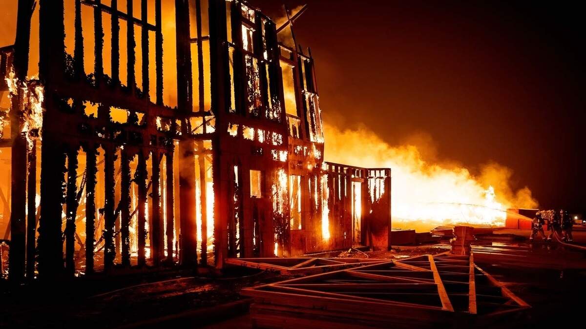 An apartment building under construction on Trail Lake Drive burned down early Tuesday morning in southwest Fort Worth, according to the Fort Worth Fire Department. No one was injured. 