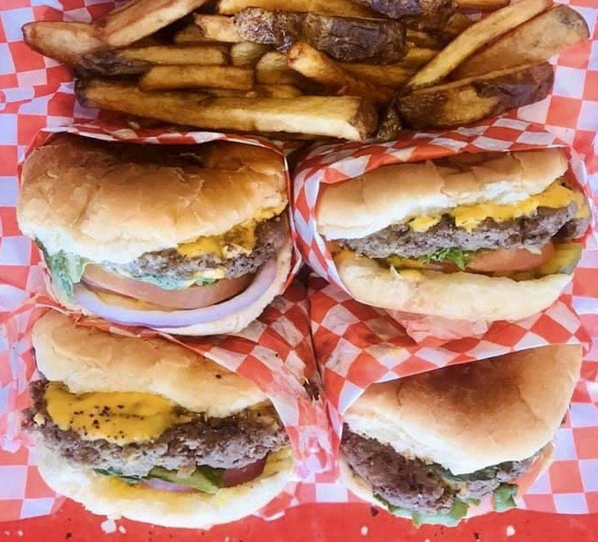 A family cheeseburger pack with fries at Tommy’s Hamburger Grill.
