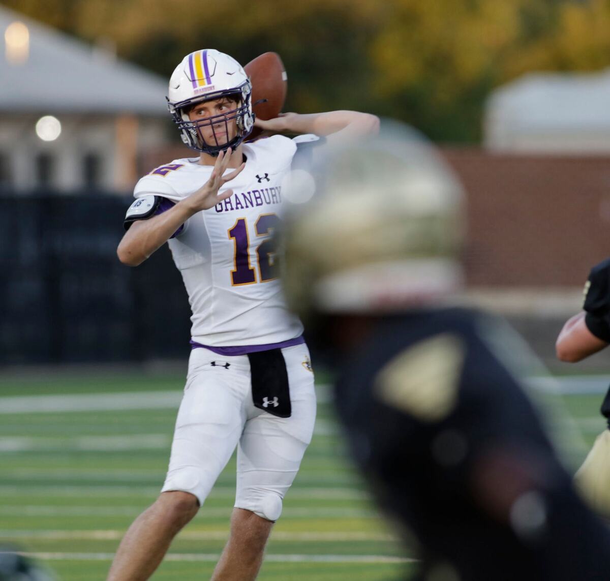 Grandbury’s quarterback Hayden Meyer throws a pass during their game Thursday night at Birdville Athletic Center. JOHN ROWLAND