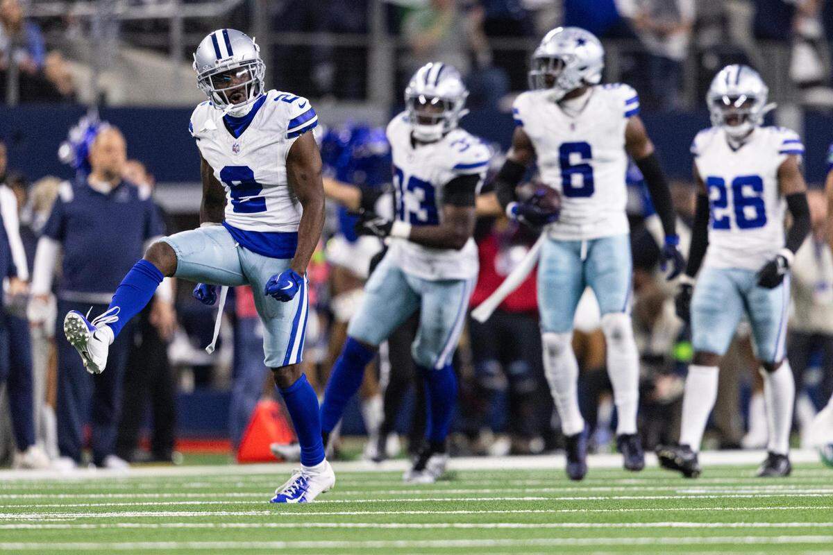 Cowboys cornerback Jourdan Lewis (2) celebrates after getting a fourth down stop in the fourth quarter of an NFL game between the Dallas Cowboys and the Seattle Seahawks at AT&T Stadium in Arlington on Thursday, Nov. 30, 2023. The Cowboys came out on top 41-35.