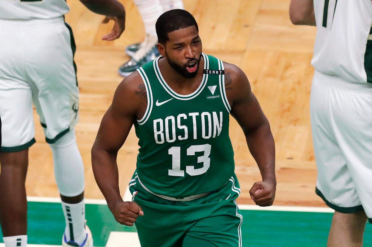 Boston Celtics’ Tristan Thompson reacts during the first half of an NBA basketball game against the Milwaukee Bucks, Wednesday, Dec. 23, 2020, in Boston. (AP Photo/Michael Dwyer)