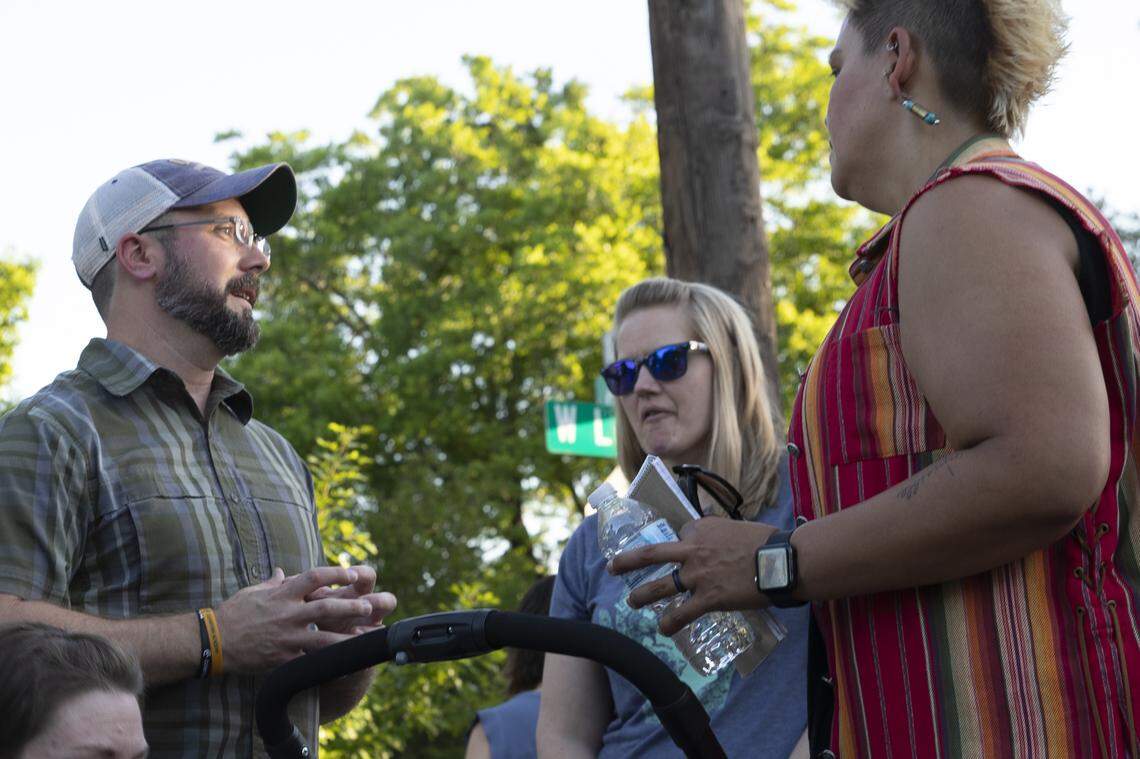 Jeff King talks to residents after a press conference following a walk to celebrate the safe return of a kidnapped girl Sunday, May 19, 2019, at Ryan Place in Fort Worth. King was instrumental in helping police locate the girl.