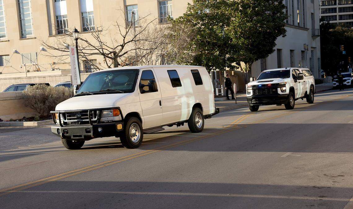 Law enforcement escort nine defendants indicted in connection to the nonfatal shooting of a police officer outside a North Texas ICE detention center last year from the federal courthouse in downtown Fort Worth on Monday, Feb. 23, 2026. A second attempt of the trial began Monday after the judge declared a mistrial during jury selection in the previous trial.