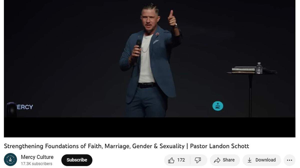 A screenshot of a video of pastor giving a sermon at a mega church.