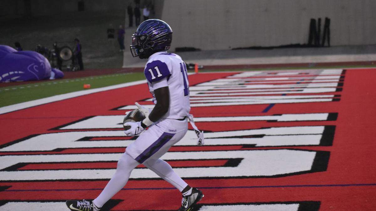 Crowley’s Curtis Johnson (11) scores a touchdown for the Eagles during a high school football game against Paschal at Farrington Field in Fort Worth, Texas, Thursday, October 12, 2023. Johsnon scored four touchdowns for the Eagles during the game.
