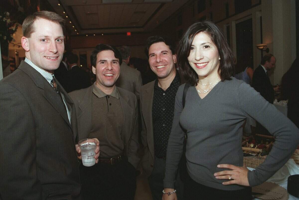 March 19, 1999: A pre-grand opening VIP party sneek peek for the new Southlake Town Square was held at the Corner Bakery Cafe. From left: Dr. Steve Fuqua, Robert Garza, Rick Garza, Brenda Garza.