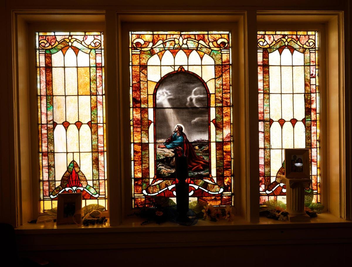 One of the many ornate stained glass windows and doors allows in an abundance of light before morning services at Mount Gilead Baptist Church in Fort Worth.