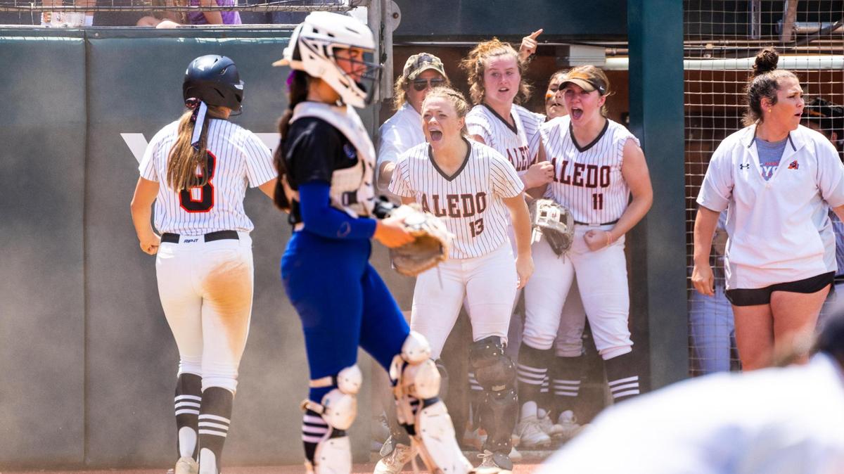 Aledo’s dugout celebrates a run during the 5A UIL State Softball semifinal between Aledo and Georgetown in Austin Texas, on June 3rd, 2021.