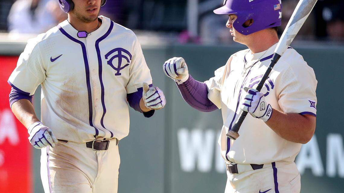 TCU's Adam Oviedo (L) gets congratulated by Josh Watson (R) after scoring a run against Long Beach State, Sunday afternoon, February 25, 2018 played at Lupton Stadium.