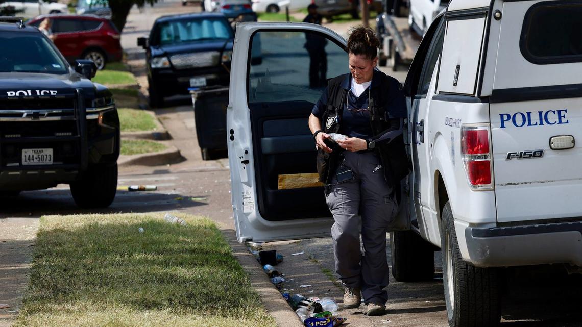 Members of the Fort Worth Police Department investigate a fatal shooting on Friday, July 5, 2024, that occurred the evening prior near the intersection of Castleman Street and Comanche Street.