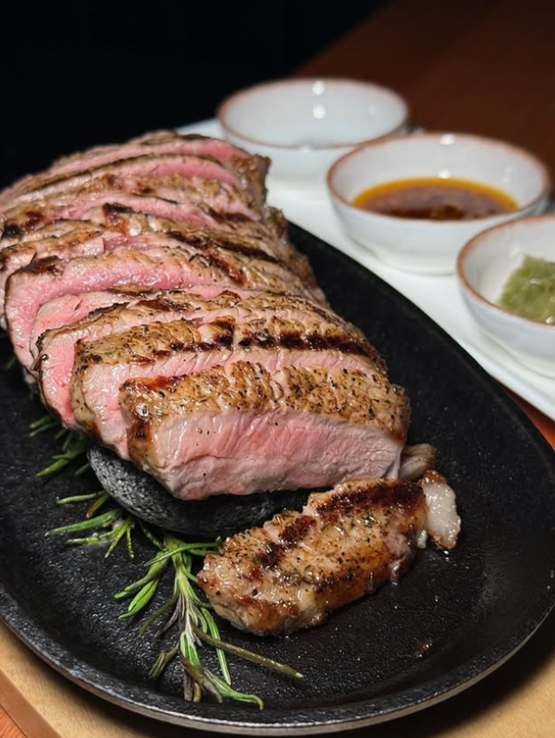The Japanese A5 wagyu is served on a hot rock with wasabi salsa, garlic chili oil and truffle salt.