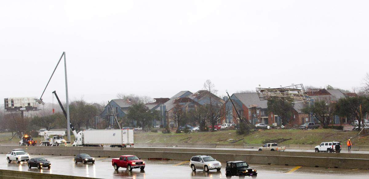 Damage from a tornado in Garland is visible from I-30 on Sunday, December 28, 2015.