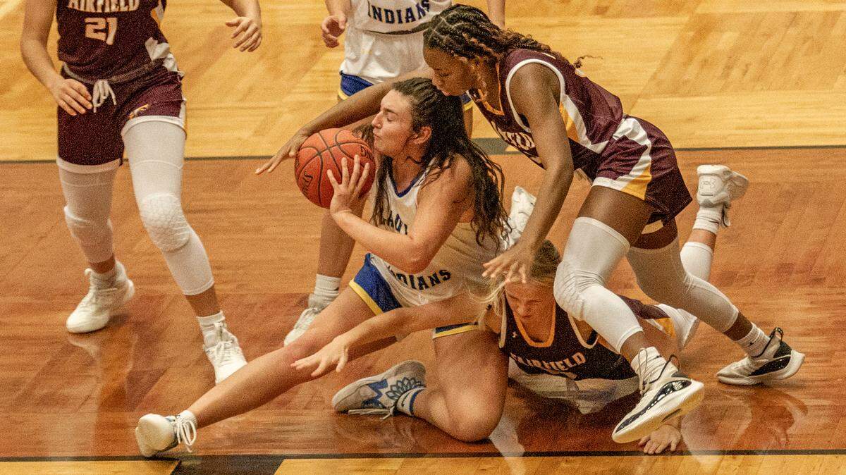 Lipan forward Trinity Benitez battles for the ball as Class 2A Lipan defeats 3A Fairfield, 45-33, in a game at home earlier in the season.