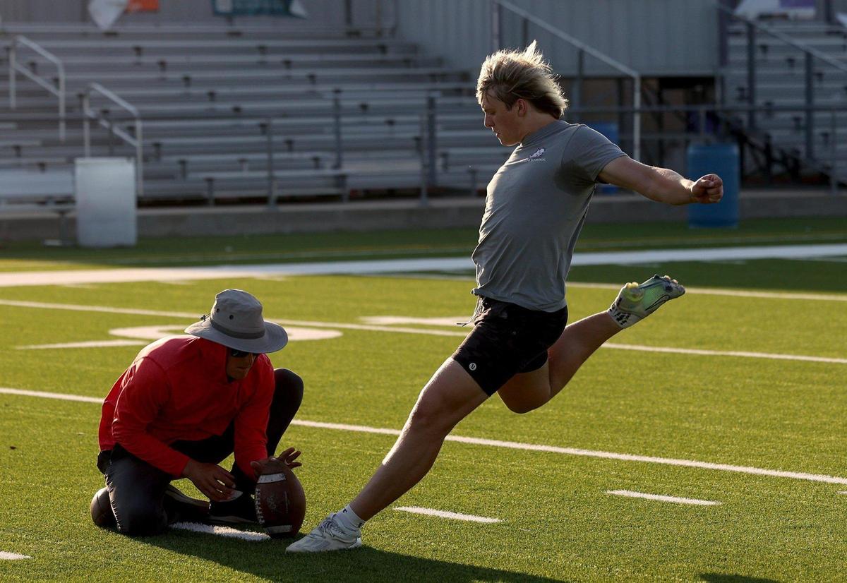 Southlake Carroll kicker Kyle Lemmermann works out with former TCU kicker Jaden Oberkromworkout on Monday, July 24, 2023, at Paschal High School in Fort Worth. Lemmermann is a TCU commit and Chris Sailer’s No. 1 ranked kicker in the nation.