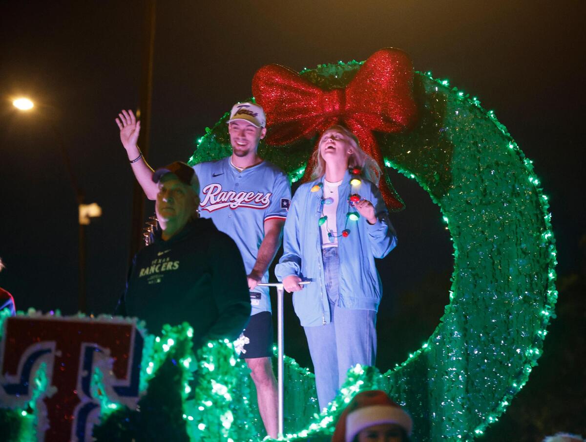 Texas Rangers left-fielder Evan Carter was the grand marshal.