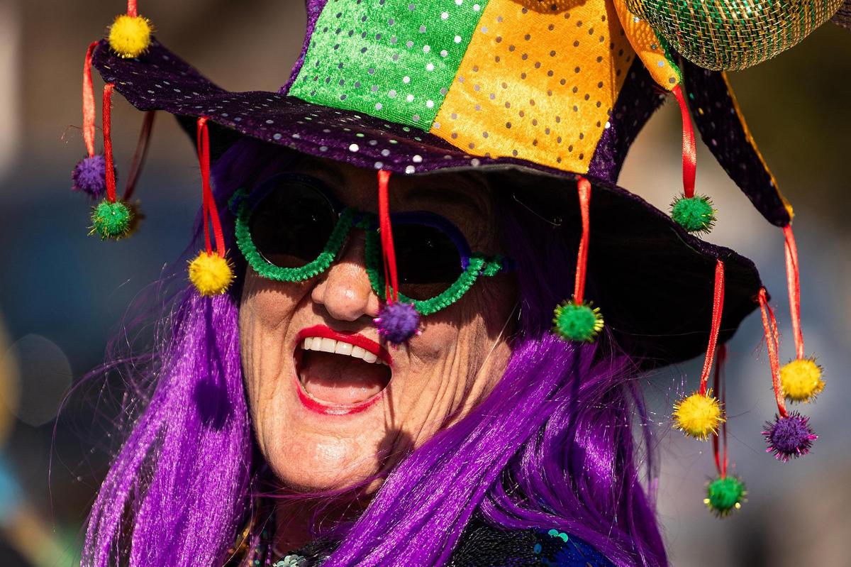 Tina Moore of the Texas Glamma’s laughs during the parade for the 15th Annual Mardi Gras Nocona Style on Clay Street in Nocona on Saturday, Mar. 1, 2025.