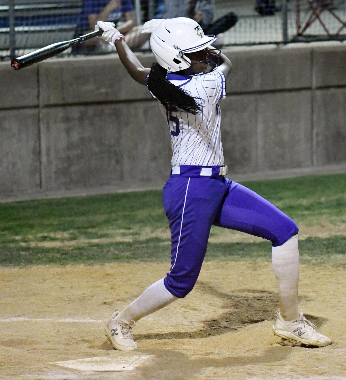 Timber Creek’s Saniya Hill hits a ribi single to tie Southlake Carroll 1-1 in the second inning of Tuesday’s, April 19, 2022 district 4-6A softball game at Timber Creek High School in Fort Worth, Texas. Timber Creek went on to win 6-3. Special/Bob Haynes