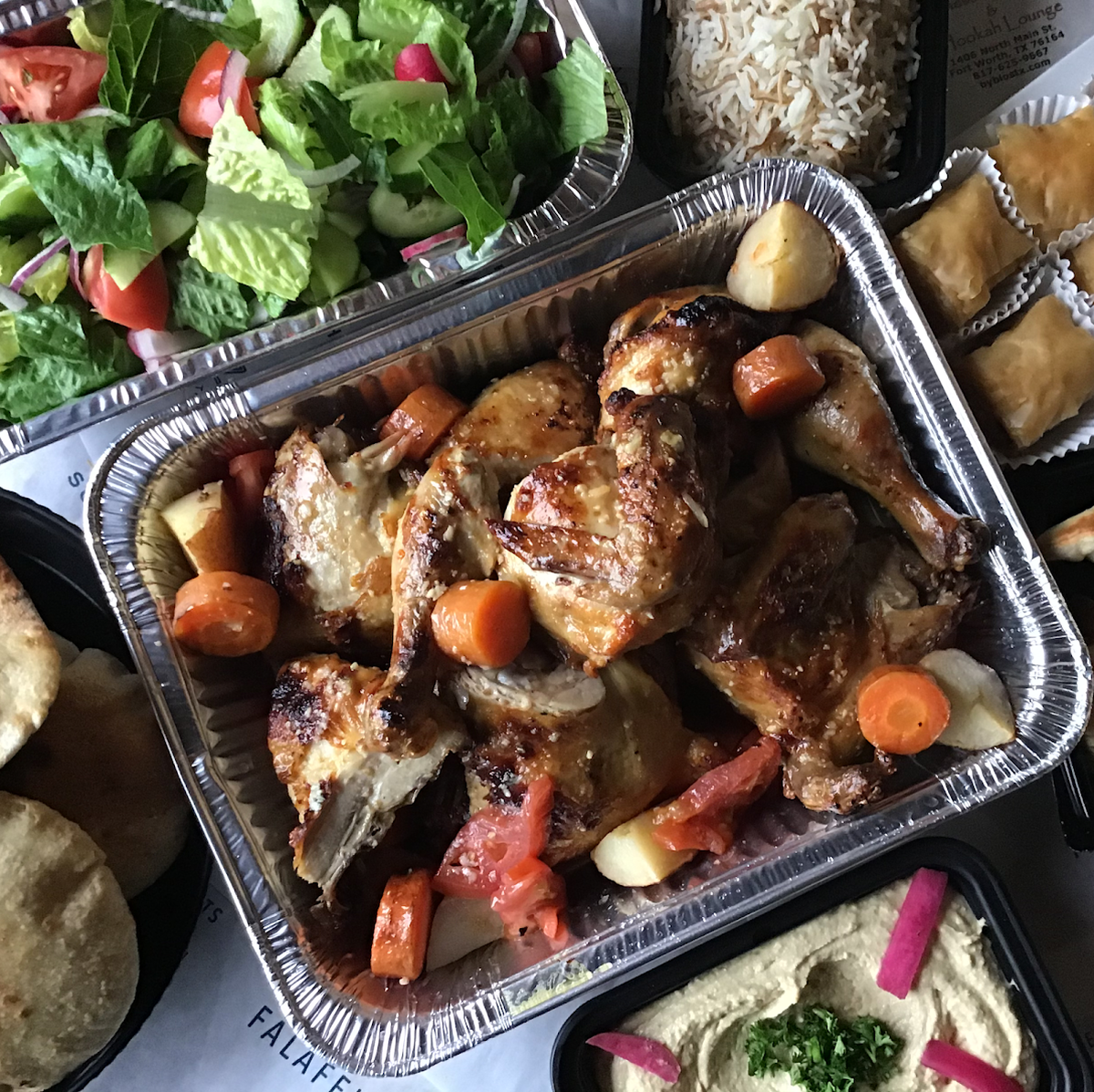 A taekout garlic-lemon roast chicken pack at Byblos Mediterranean.