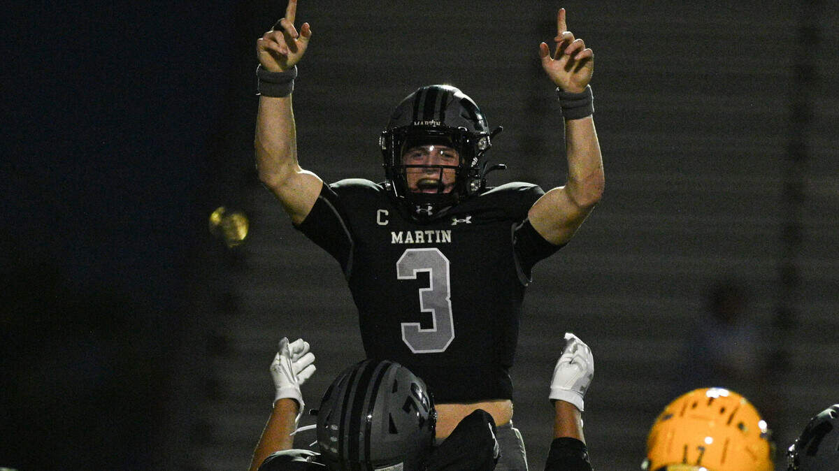 Arlington Martin quarterback Brooks Briggance celebrates in a 55-3 victory over Arlington Lamar in a UIL high school football game in Arlington, Texas on September 20, 2024.