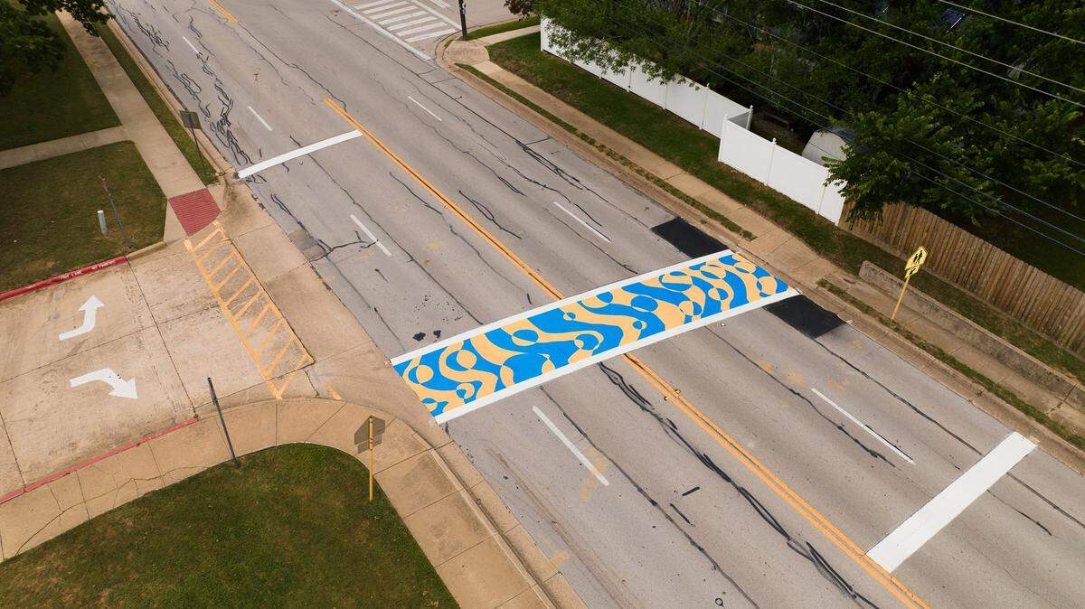 In 2023, the city of Bedford challenged Harwood Junior High School art students to create a design for the crosswalk at Martin Drive, directly in front of the school. This winning design now must be removed under a directive from Gov. Greg Abbott.