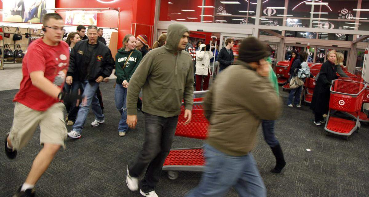 2010: Shoppers at Super Target in Allen, Texas, run into the store at 3 a.m. to take advantage of Black Friday deals.