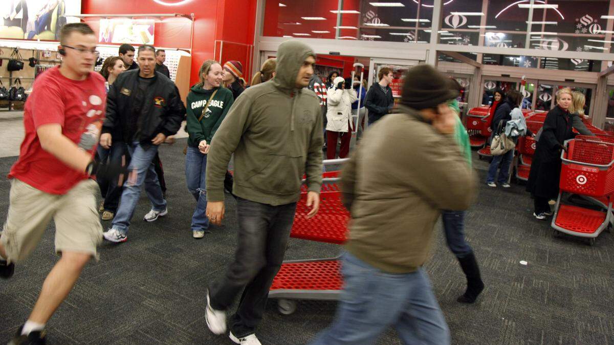 2010: Shoppers at Super Target in Allen, Texas, run into the store at 3 a.m. to take advantage of Black Friday deals.
