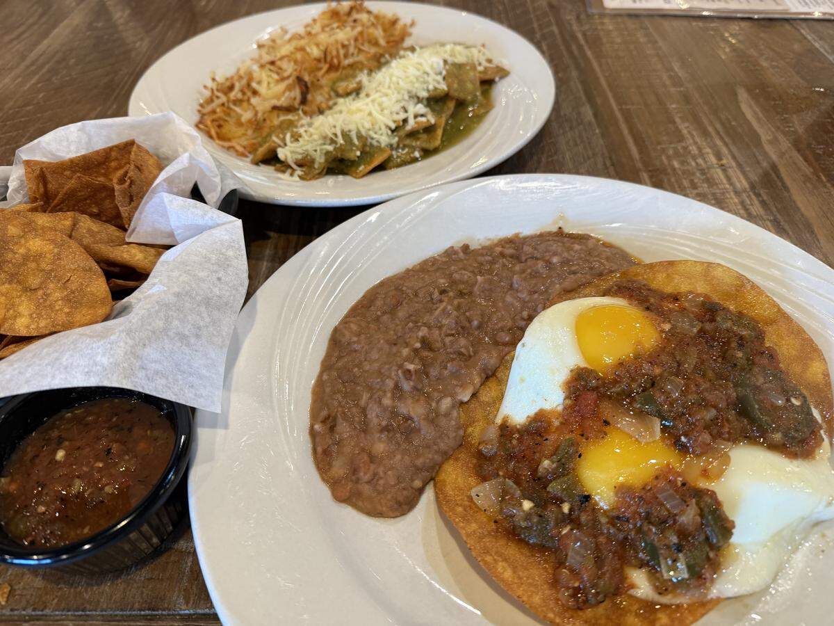 Huevos rancheros, chilaquiles verdes and chips at Heaven’s Gate Restaurant in Fort Worth, seen Oct. 11, 2025.