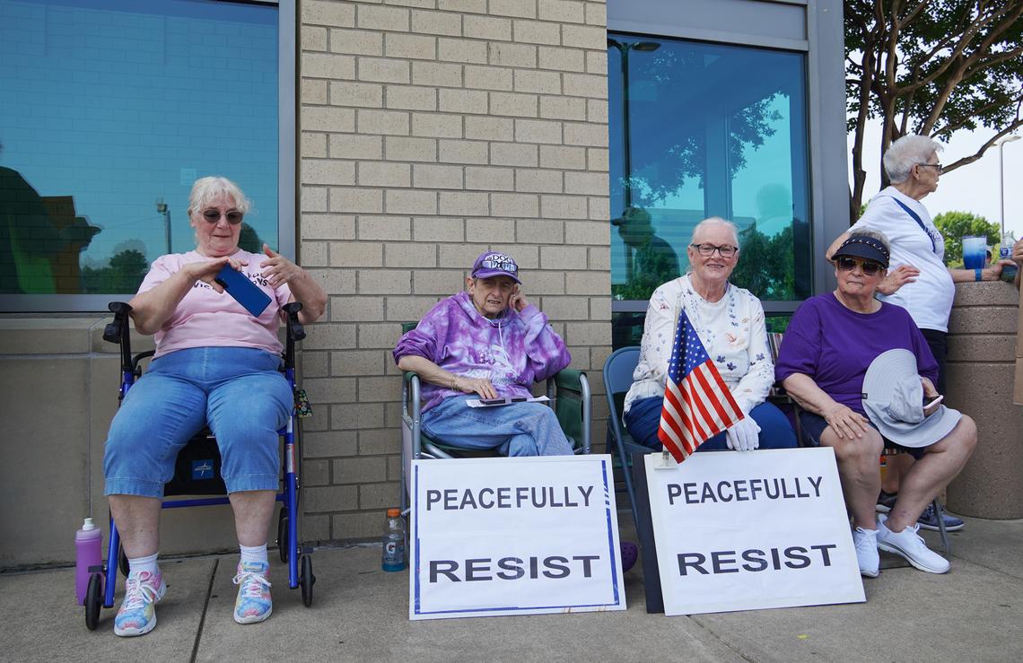 Protesters gather for the “No Kings Day” protest on June 14, 2025 in Arlington.