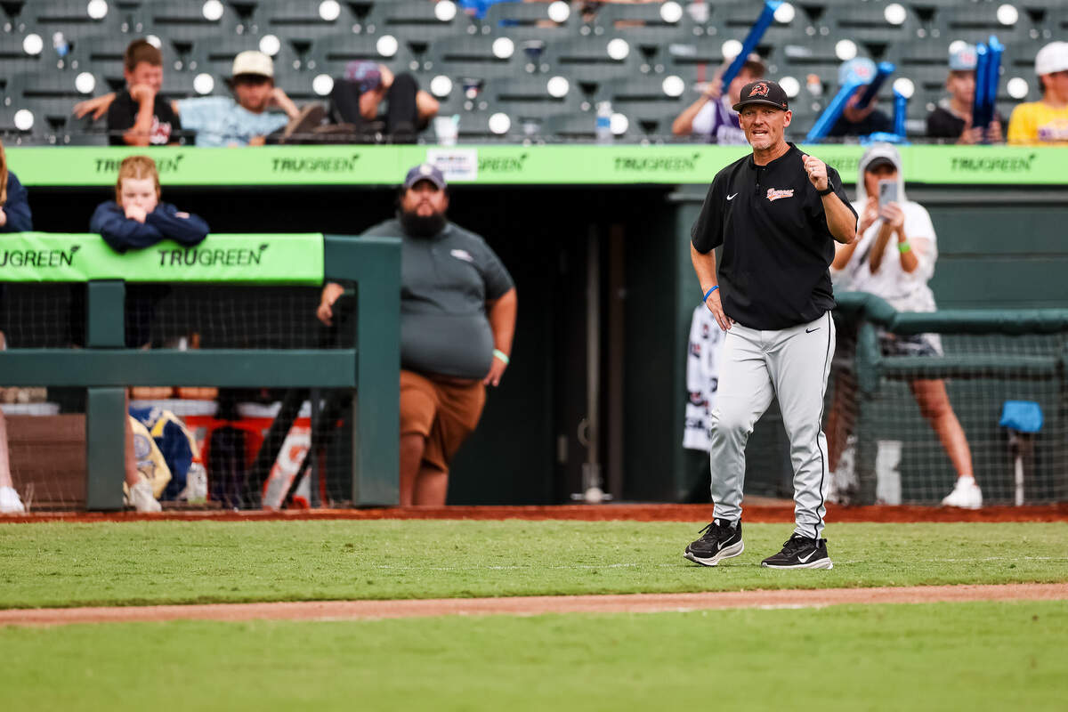 Aledo head coach Chad Berry yells toward his dugout while the Bearcats are hitting against Montgomery Lake Creek in the UIL Class 5A Division I baseball state championship game on Friday, June 5, 2026, at Dell Diamond in Round Rock, Texas.