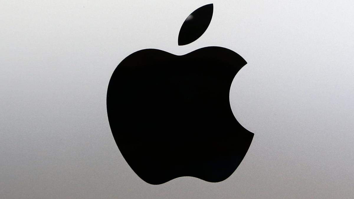 FILE - In this Aug. 7, 2017 file photo, the Apple logo at a store in Hialeah, Fla. (AP Photo/Alan Diaz, File)