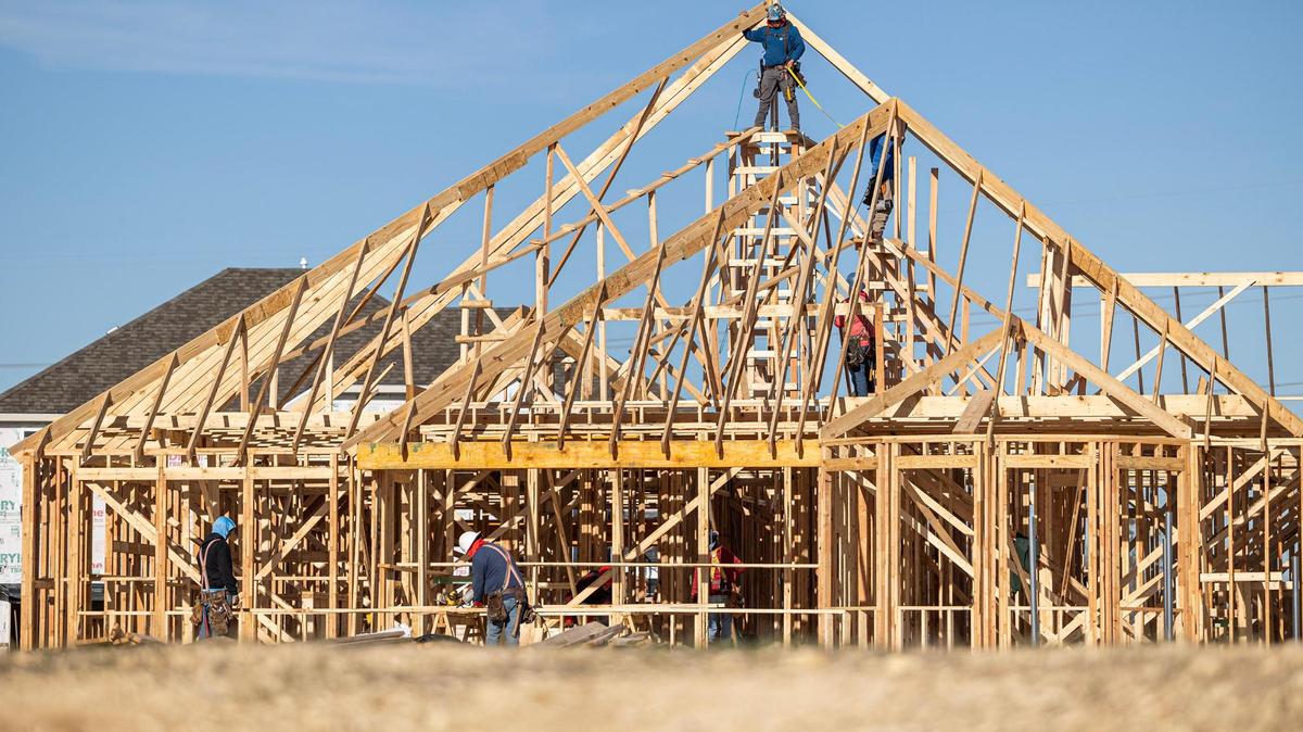 Construction workers piece together a home near the intersection of Bonds Ranch Road and Willow Springs Road in North Fort Worth on Friday, Dec. 27, 2024.