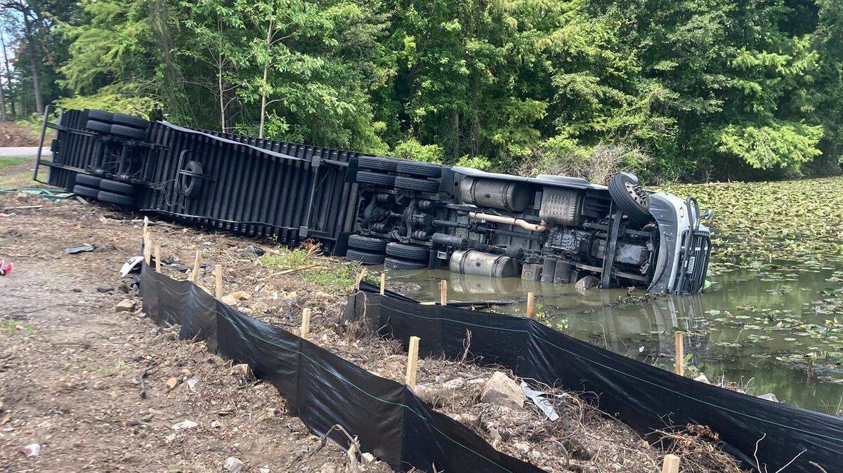 A semi-truck carrying 20,000 pounds of ramen noodles tipped over in an Arkansas lake Tuesday.