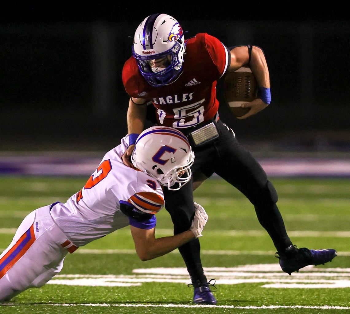 Lake Country running back Hayden Whites (15) tries to break free of Colleyville Covenant defensive back Daniel Calbrese (2) during the first half of a high school football game, October 30, 2020 played at Lake Country Christian School in Fort Worth, Tx. (Steve Nurenberg Special to the Star-Telegram)